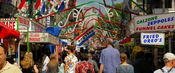 a picture of people at the San Gennaro Street Festival in Little Italy in NYC