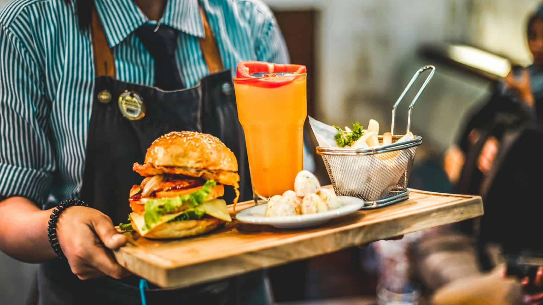 waiter serving food