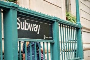 A New York City Subway entrance. Image Source: Pixabay user StockSnap under CC0 Creative Commons license.