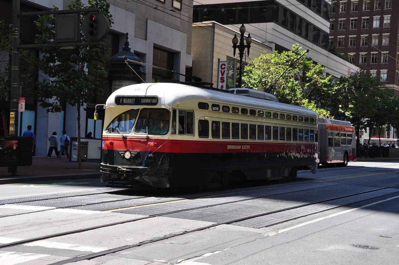 The F Market street car to Fisherman's wharf rolls along the streets of San Francisco