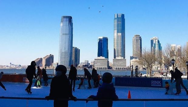people skating on an outdoor rink