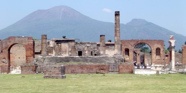 Pompeii with Mount Vesuvius in the background. Image Source: Wikimedia user Qfl247 on January 4th, 2010.