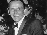 Actor and Musician Frank Sinatra at Girl's Town Ball in 1960. Image Source: Wikimedia via National Archives on March 12, 1960.