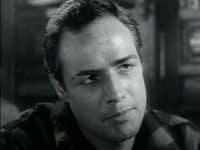 Actor Marlon Brando. Image Source: Screenshot from On the Waterfront trailer via IMDb.