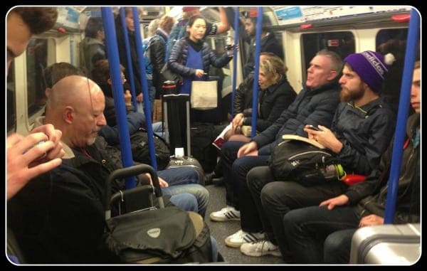 Crowded Piccadilly Line with Luggage