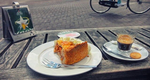 A pastry and an espresso at a local cafe in Amsterdam. Image source: Pixabay user Edar.
