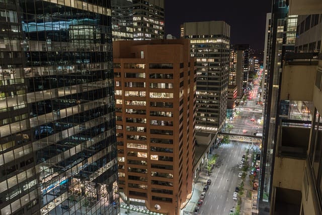 Downtown Calgary after dark. Image source: Pixabay user Cornelia Schneider-Frank.