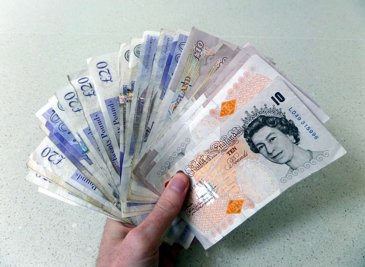 A handful of British banknotes. Image source: Pixabay user Chris.