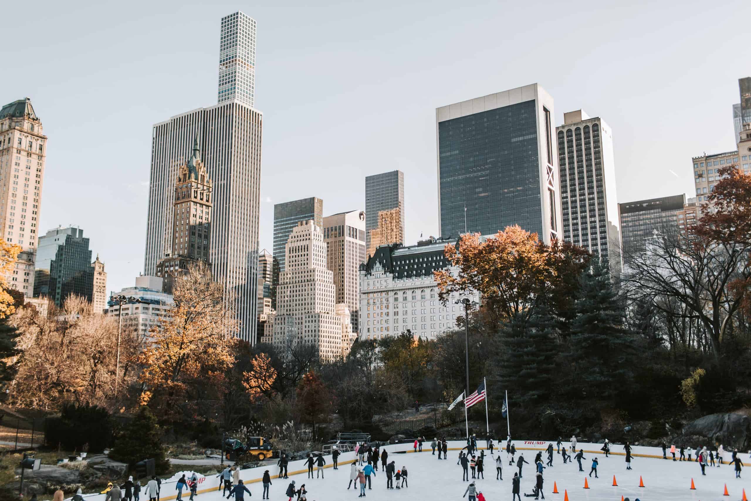 Ice skaters on a rink in Central Park