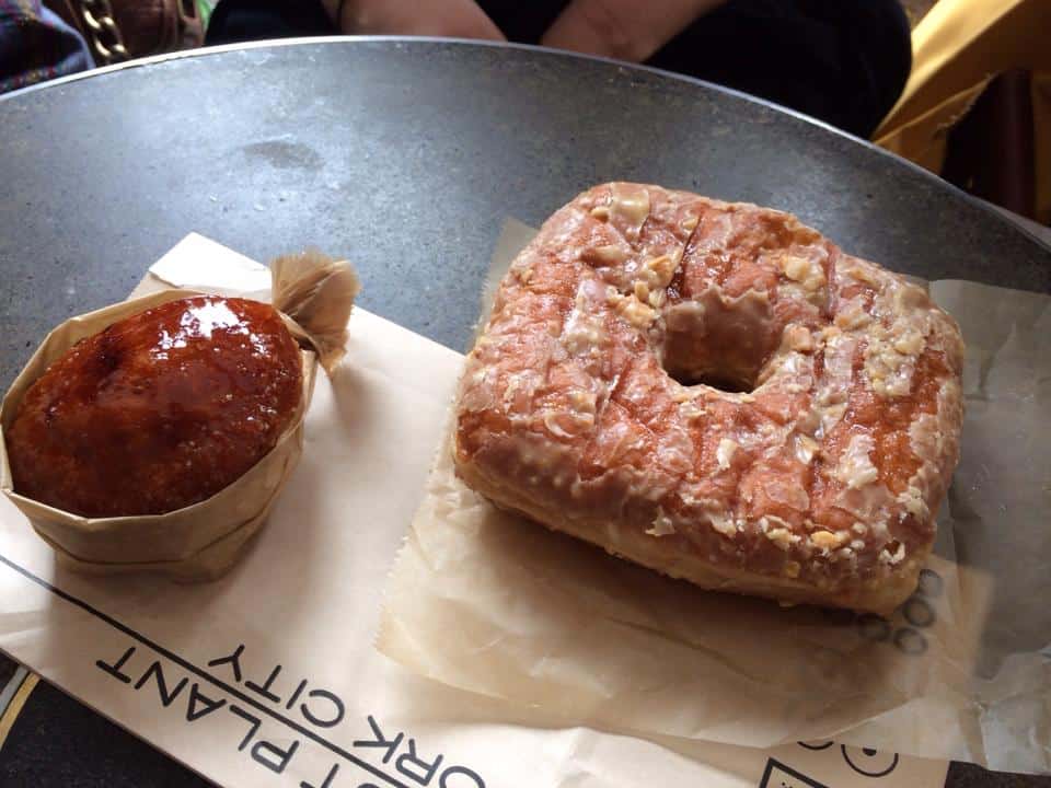 Vanilla Bean and Strawberry Jam filled square doughnut with Madagascar vanilla bean glaze and a Creme Brûlée doughnut from The Doughnut Plant shop on the Lower East Side of Manhattan