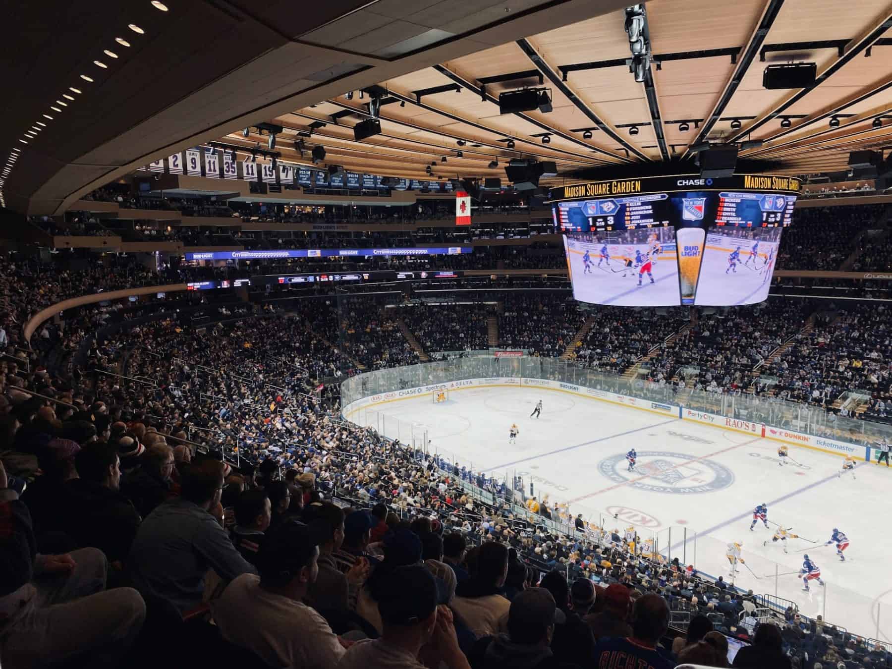 a view of the rink and the crowd at at a Rangers Ice Hockey game at Madison Square Garden 